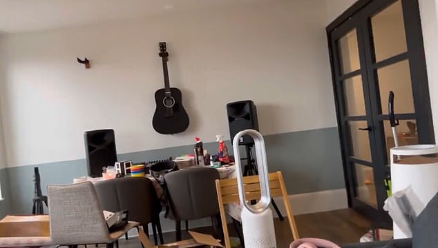 In a video tour of his apartment, he showed his guitar on the wall and said he was writing new songs.