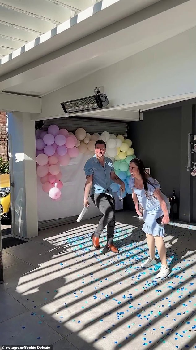 The miraculous double car crash survivor shared a glimpse of the festivities, right up to the moment she popped blue confetti that revealed she was expecting a boy.