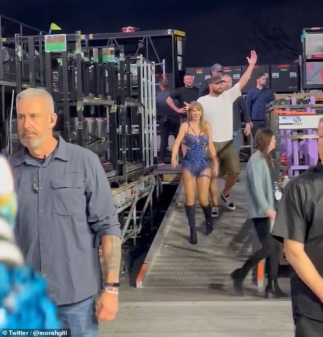 Travis Kelce and Taylor Swift were greeted with standing ovations as they left the stage in Amsterdam