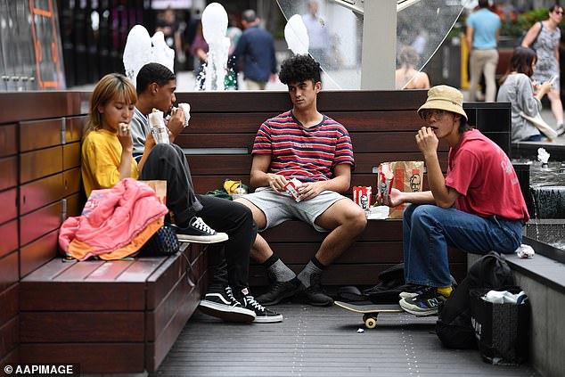 Gen Z adults, born from 1997 onwards, are the least likely to pay a mortgage, but have the least savings because they are more likely to be renting or paying off college debt (pictured are young people in Brisbane)