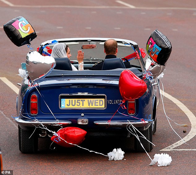 Prince William drives with his wife Kate as they leave Buckingham Palace for Clarence House after their wedding, April 29, 2011