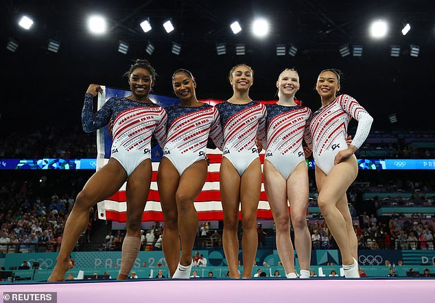 Simone Biles, Jordan Chiles, Jade Carey, Sunisa Lee and Hezly Rivera celebrated after the victory