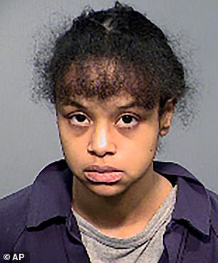 This undated booking photo provided by the Flagstaff Police Department shows Elizabeth Archibeque.