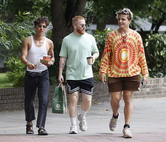 The group was also joined by Carlos Gu, who looked dapper in a vest and jeans.