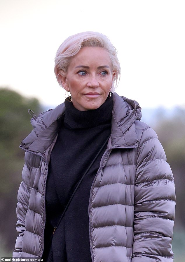 The ex-wife of TV weatherman Steve Jacobs looked almost unrecognisable after ditching her brunette locks for a shorter platinum blonde cut.