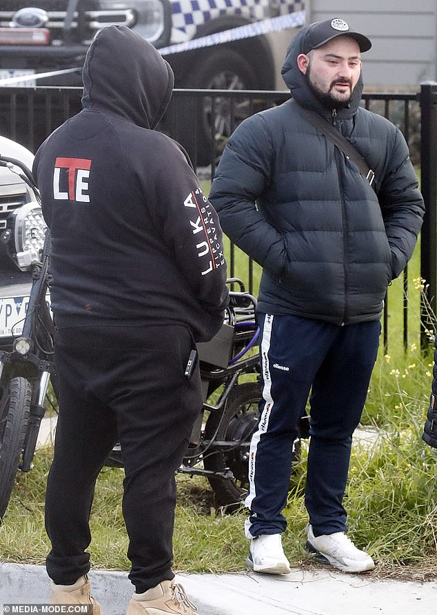 Abdul's uncle, Cory Lewis, outside the unit after the shocking deaths.