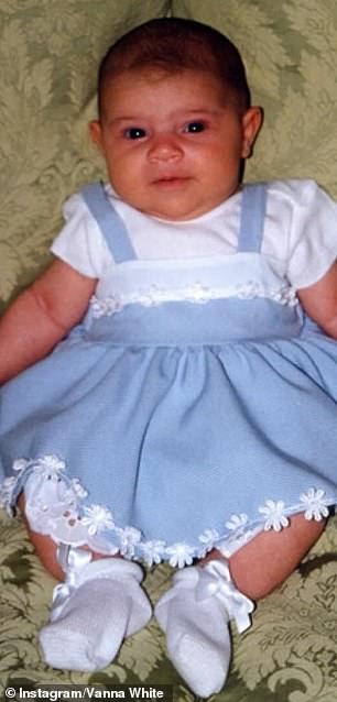 One of the photos showed Gigi as a baby wearing a blue dress.