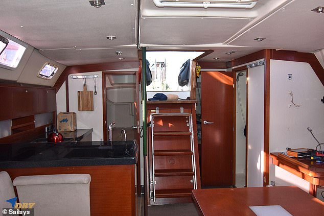 Inside the mahogany-clad luxury yacht Taloha, where the bodies of a couple in their 50s and 60s were found Thursday morning after they failed to return home Tuesday.