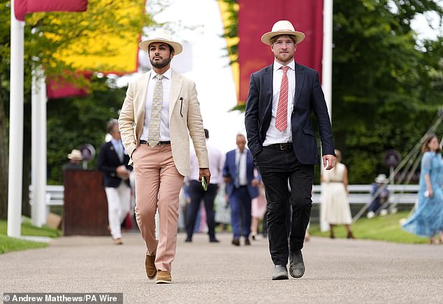 Men out for a treat opted for mismatched summer suits and sailor hats to get through the day.