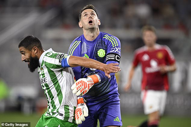 Tom Heaton (right) was given a rare starting opportunity thanks to Ten Hag and took a while to adjust to the game.