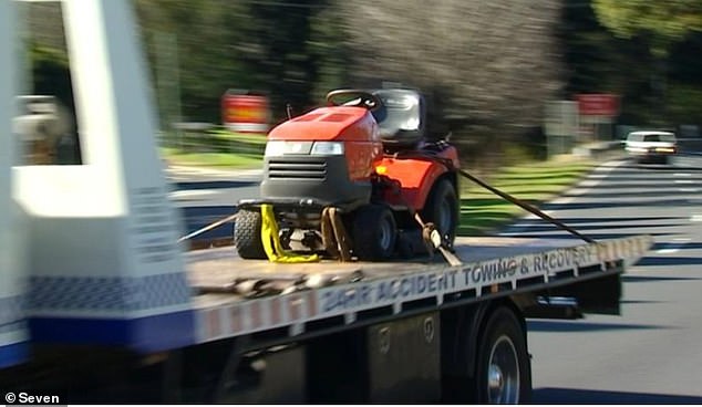 Detectives spent Tuesday collecting evidence from the home (including the lawnmower, pictured), which has now been declared a crime scene.