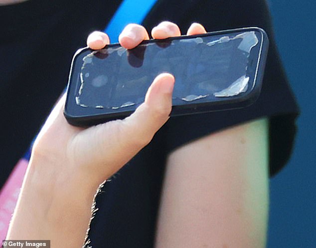 The 18-year-old's black iPhone had a worn screen protector on the sides.