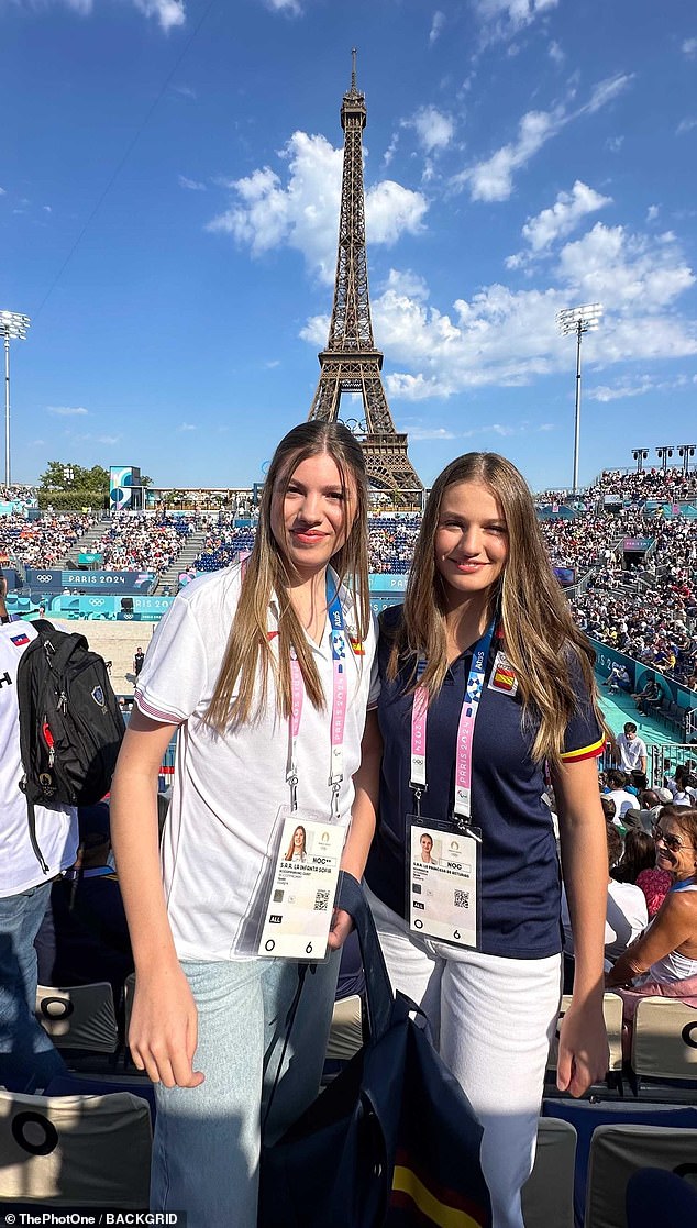 The couple smiled for a photograph in front of the Eiffel Tower as they supported Spanish athletes competing in the Olympic Games.