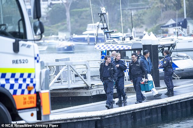 The couple are believed to have suffered no physical injuries, but a gas leak is one of the lines of inquiry that police will be looking into (pictured: police at the scene).