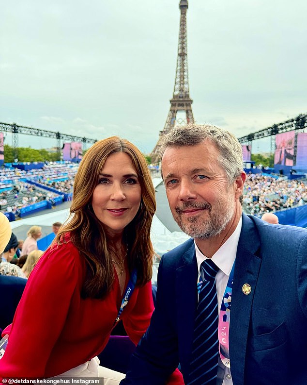 Danish monarchs Queen Mary and King Frederik took a stunning photo with the Eiffel Tower behind them minutes before the opening ceremony.