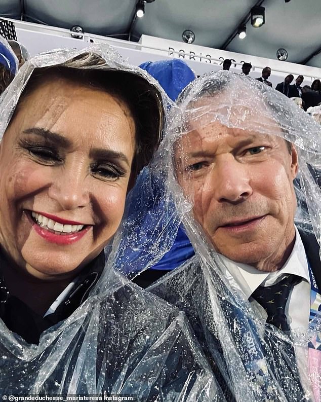 Luxembourg royals Grand Duchess Maria Teresa and Grand Duke Henri posted a fun selfie from the opening ceremony, not letting the rain dampen their spirits.