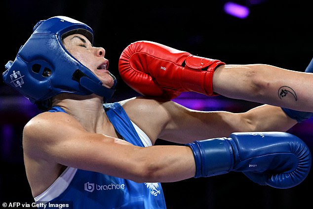 Carini (pictured) was violently attacked in the clash, which comes amid a gender dispute over her opponent, who was banned from fighting in the world championship after being deemed 