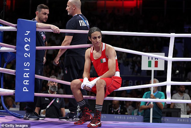 Controversial Algerian wrestler Imane Khelif (center) faced Carini in this morning's Olympic welterweight bout