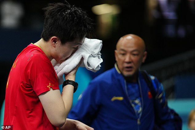 The devastated Chinese star lost his singles match to Sweden's Truls Moregard.