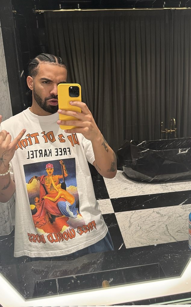 Drake celebrates Kartel's release by wearing a 'Free Kartel' t-shirt