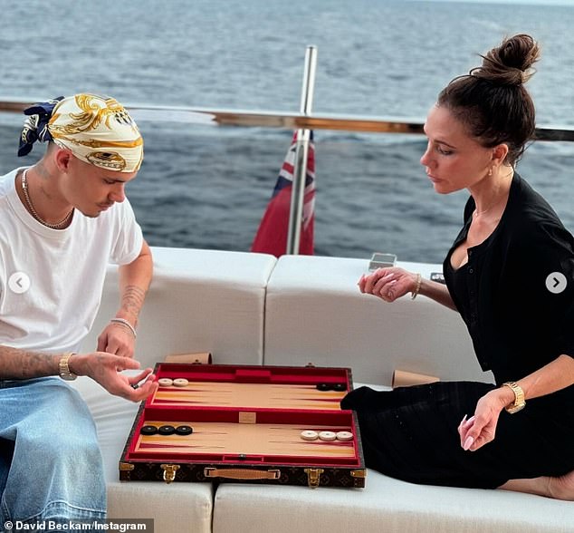 Romeo and Victoria seemed focused as they enjoyed a game of backgammon.