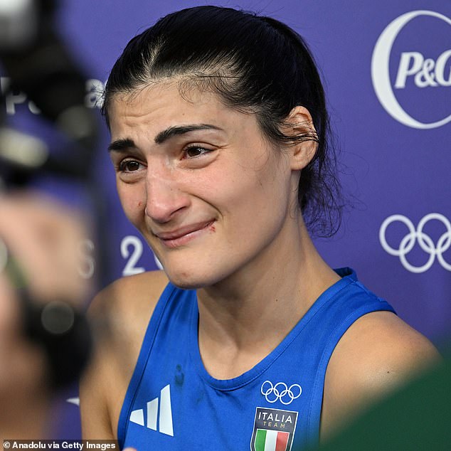 The boxer, Italian Angela Carini (pictured), was brutally hit in the nose before ripping off her helmet and ending the fight after just 46 seconds.