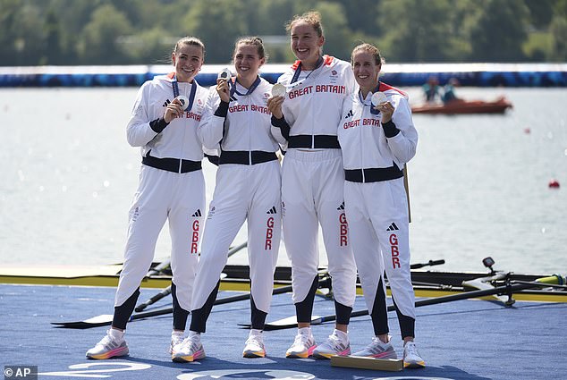 Sam Redgrave, Rebecca Shorten, Esme Booth and Helen Glover celebrate after winning their silver medals