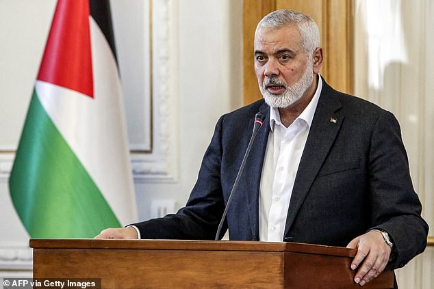 Ismail Haniyeh, head of the political bureau of the Doha-based Palestinian Islamist movement Hamas, speaks to reporters after a meeting with the Iranian foreign minister in Tehran on March 26, 2024.