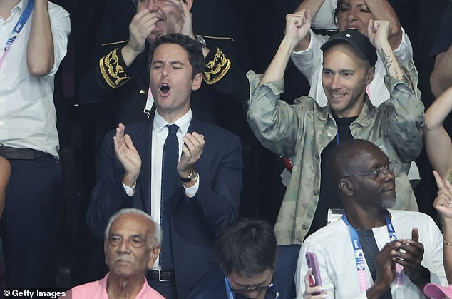 French Prime Minister Gabriel Attal encouraged Marchand to win his first Olympic gold