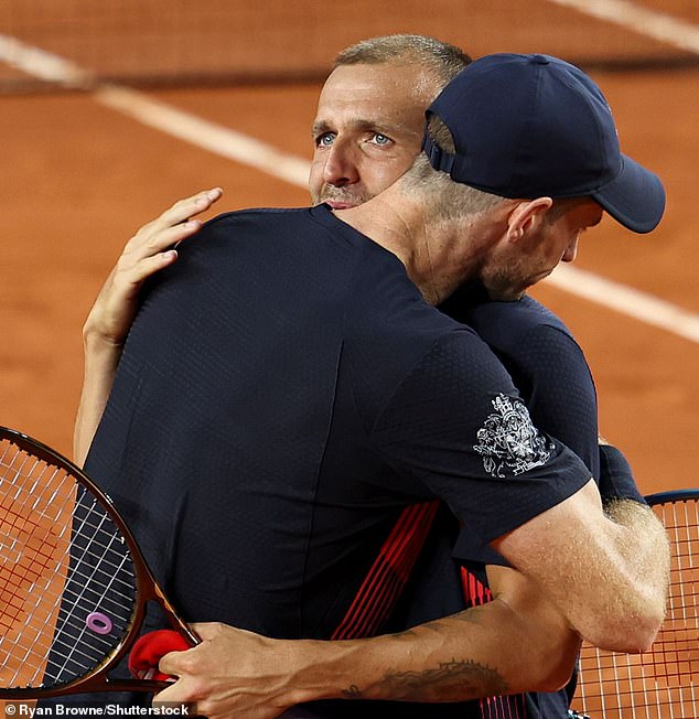 Both Murray and Evans shed tears as they shared a hug after the match at Roland Garros.