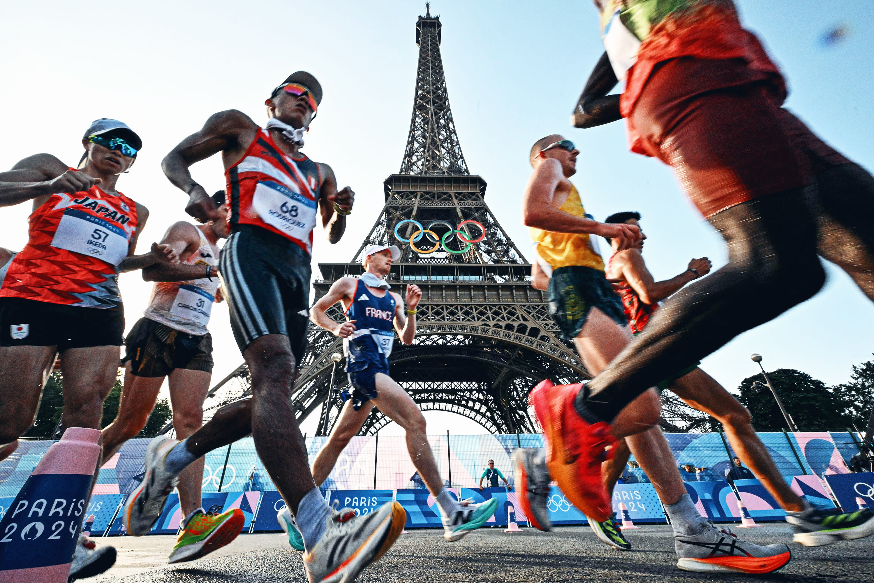 Athletes compete in the men's 20km race walk at the Paris 2024 Olympic Games athletics events at Trocadero in Paris on August 1, 2024. (Photo by LIONEL BONAVENTURE/AFP via Getty Images)