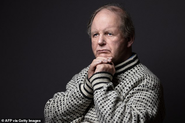 British writer Michael Morpurgo poses during a photocall in Paris on January 29, 2024