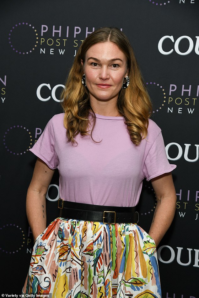 Julia paired a lilac top with a colorful skirt.