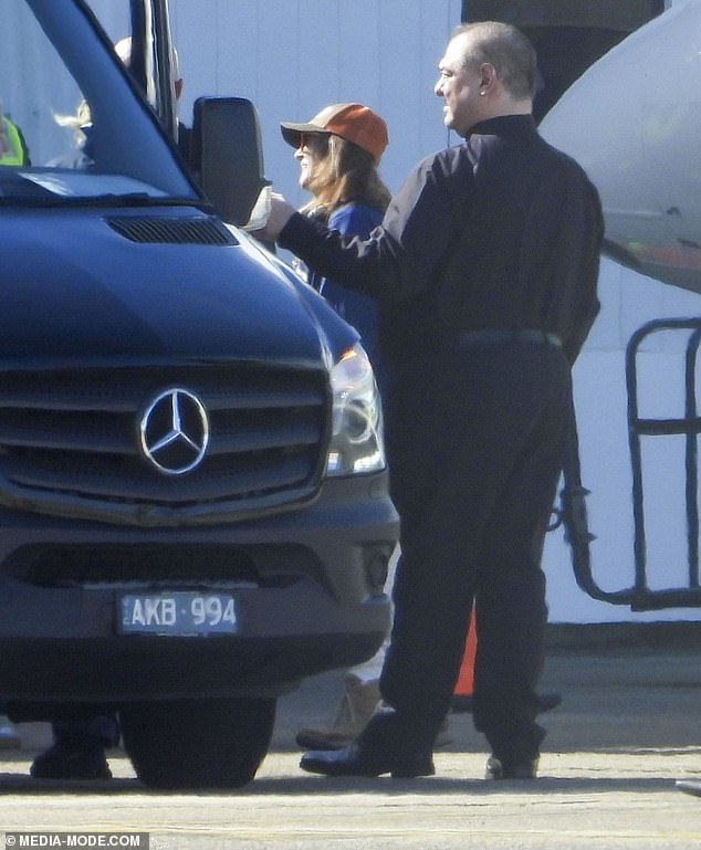 The talk show host, who is in Australia for her exclusive show An Evening With Drew Barrymore on Friday and Saturday nights, looked focused as she disembarked the plane.