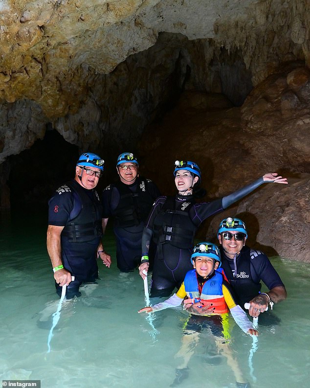 In another photo, they are seen exploring water caves with Leafar.