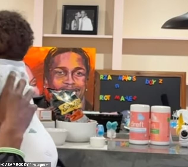 There was an adorable black-and-white photo of Rihanna and Rocky cuddling, as well as a bright orange and red painting of the couple. There was also a magnetic board on display.