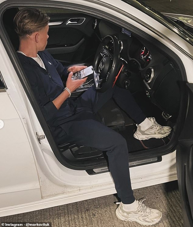 Marko is shown sitting in a car. At 16, he is currently not allowed to drive or buy alcohol, unlike his girlfriend, who is 21.