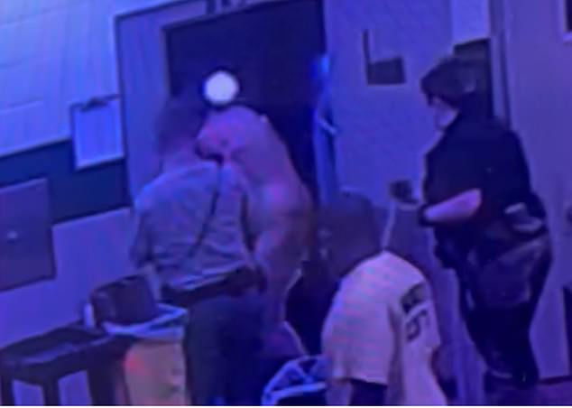 This is a screenshot from a video inside the Walker County Jail, showing a naked inmate, allegedly Mitchell