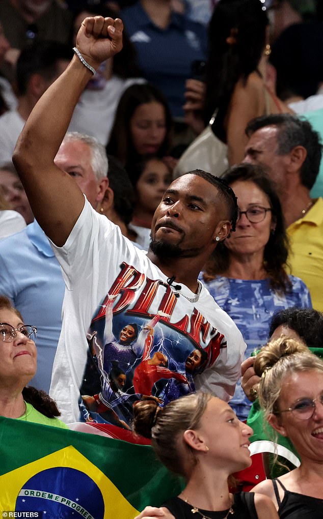 Owens looked every bit the proud husband as he supported the four-time gold medalist in the stands during the Olympic gymnastics team final.