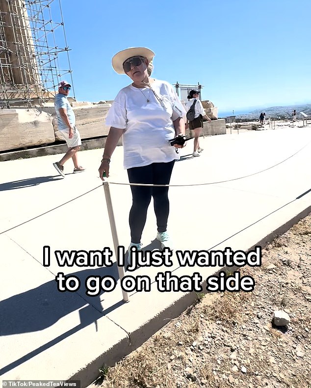 During his visit, an angry staff member ordered the man to leave the restricted area after he stepped over the rope to approach the temples which are currently being restored.