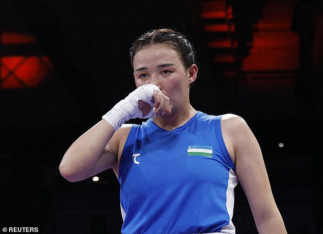 Uzbek Turdibekova burst into tears inside the boxing ring after reading the result.