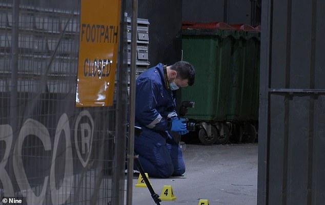 Uniformed and plainclothes officers remained at the scene late into the night collecting evidence.