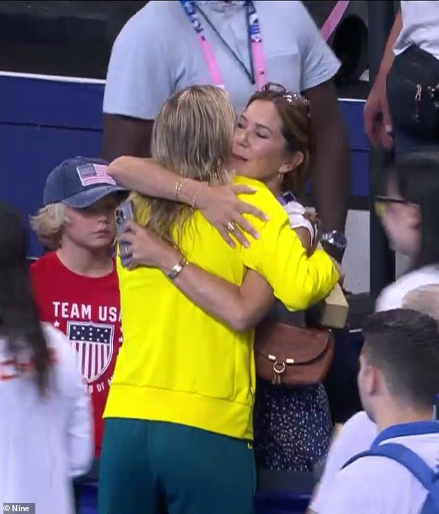 Queen Mary shared a long hug with Titmus (left) and the couple were all smiles as Australians ran into the stands to hug their friends and loved ones.