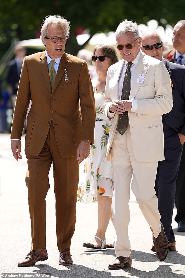 The Duke of Richmond (pictured left) donned a smart brown suit with highly polished shoes for the event.