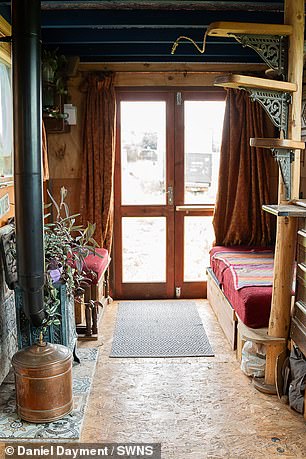 The interior of one of their off-grid homes is shown.