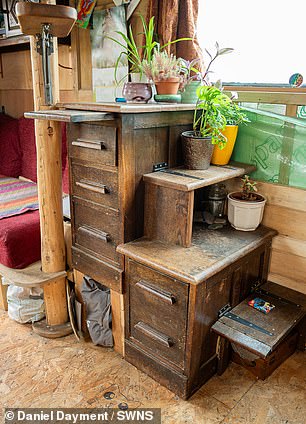 The couple has built a storage space for their clothes.