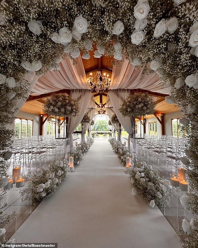 White flowers, foliage and candles filled the stunning room where Leona and Scott said 