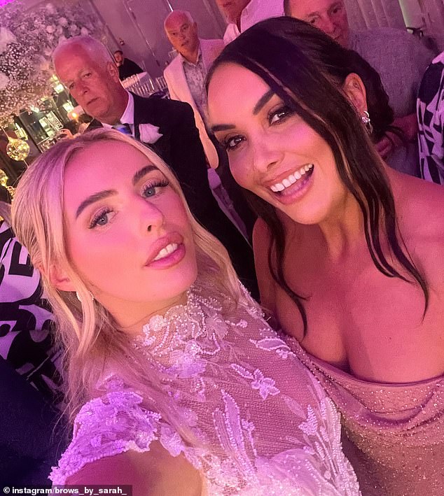 The 26-year-old posed for a selfie with her brow technician and close friend, Sarah (pictured right).