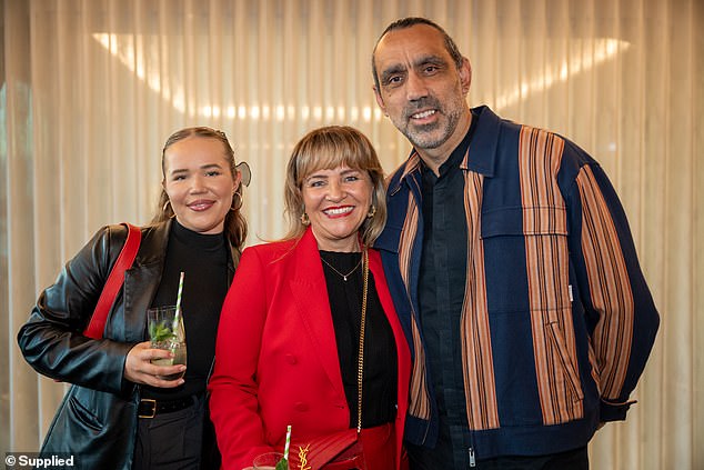 AFL legend Adam Goodes (right) was also in attendance