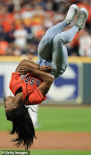 Team USA's golden girl of gymnastics did a backflip before nailing her opening throw.